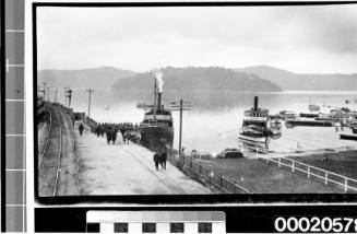 SS ERRINGHI moored at a wharf with people boarding
