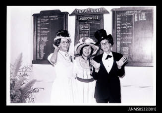 Untitled portrait of three people facing camera