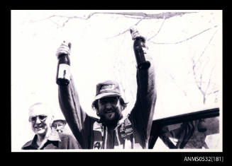 Ken Warby celebrates with champagne