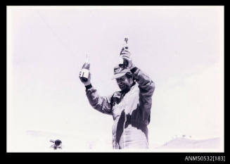 Ken Warby celebrates with champagne