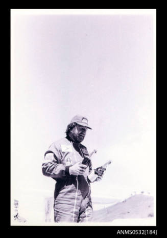 Ken Warby celebrates with champagne