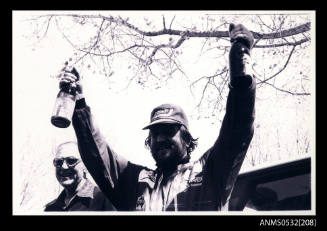 Ken Warby celebrates with champagne