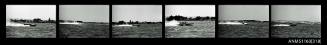 Strip of negatives depicting a power boat at high speed