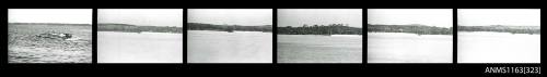 Strip of negatives depicting a power boat at high speed