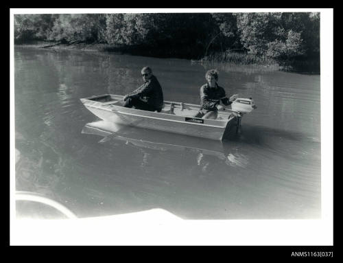 Aluminium Savage Runabout punt with Evinrude outboard engine