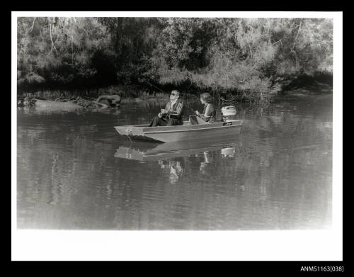 Aluminium Savage Runabout punt with Evinrude outboard engine