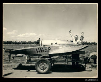 WASP hydroplane early model constructed of aluminium and marine plywood with engine cover secured by leather trap