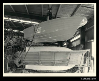 The view of fibre glass boat hull, keel, bow/starboard side view, at upper corner