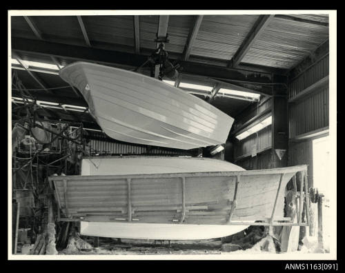 The view of fibre glass boat hull, keel, bow/port side view, at upper corner