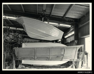 The view of fibre glass boat hull, keel, bow/port side view, at upper corner