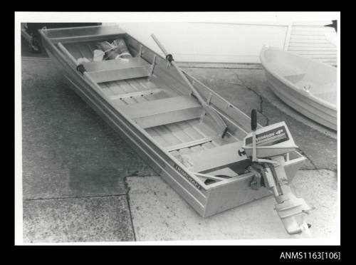 Trimcraft punt with Evinrude 4S outboard engine