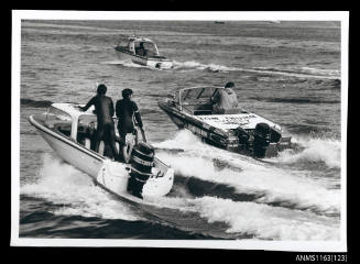 TOM THUMB KW33N , open power boat with Mercury outboard motor driven by Hans Tholstrup