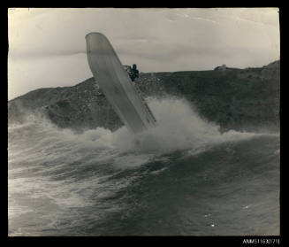 Dive & Surf demonstrator power surf boat cresting a wave