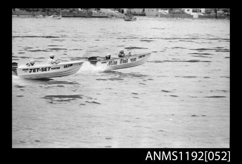 Black and white negative number 11 depicting two power boats Jet-set HUNTER  and MISS KRIS TOO Jh57n with outboard engines 