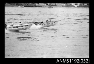 Black and white negative number 11 depicting two power boats Jet-set HUNTER  and MISS KRIS TOO Jh57n with outboard engines 