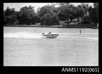 Black and white negative number 20 depicting open power boat Jet-set HUNTER Hatwo4n with outboard engine