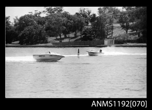 Black and white negative number 27A depicting image open power boat Bars pride Jt55n with outboard engine