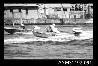 Black and white negative number 15 depicting open power boat Penta-STAR , Al71n And MAY-AN-ISE , Cp48n Neck to neck, outboard engines at speed