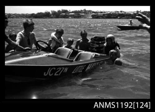 Black and white negative number 25A depicting LITTLE HUNTER , Jctwo7n Being pushed aside by several people