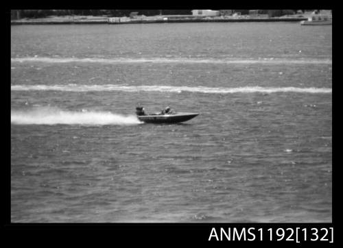 Black and white negative number 33 depicting NIPPER WASP At speed