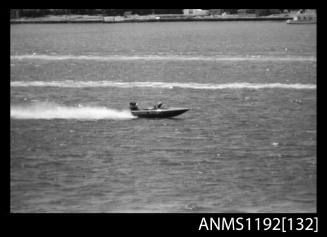 Black and white negative number 33 depicting NIPPER WASP At speed