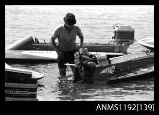 Black and white negative number 3 depicting three power boats including 7197S And Aa8twon