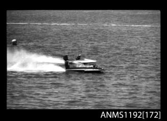 Black and white negative number 36 depicting two power boats at speed, including Futwo9 , Neck to neck