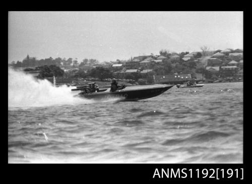 Black and white negative number 3A depicting JO-BLO Py5n Power boat at speed