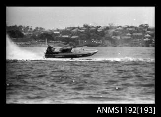 Black and white negative number 5A depicting Jawan iii , Hjin Power boat at speed