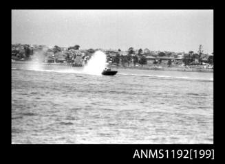 Black and white negative number 11A depicting power boat at speed  Bow/ starboard side view at Stuart Doyle Gold Cup in New South Wales