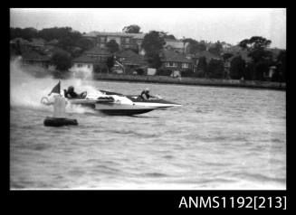 Black and white negative number 4A depicting two power boats at speed abreast