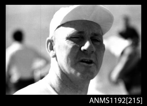 Black and white negative number 6A depicting face of man wearing baseball cap at Stuart Doyle Gold Cup in New South Wales