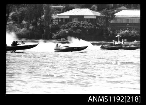 Black and white negative number 9A depicting four power boats He15n , Jawan iii And Hjin And two other power boats ander way