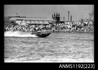 Black and white negative number 15 depicting power boat at speed  Bow/ starboard side view at Stuart Doyle Gold Cup in New South Wales