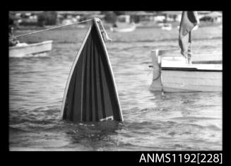 Black and white negative number 20 depicting bow of sunken power boat above the water at Stuart Doyle Gold Cup in New South Wales
