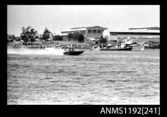 Black and white negative number 13 depicting JO-BLO , Py5n Power boat at speed