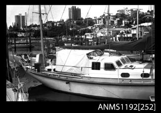 Black and white negative number 11 depicting view of aft two-thirds of yawl rigged motor yacht