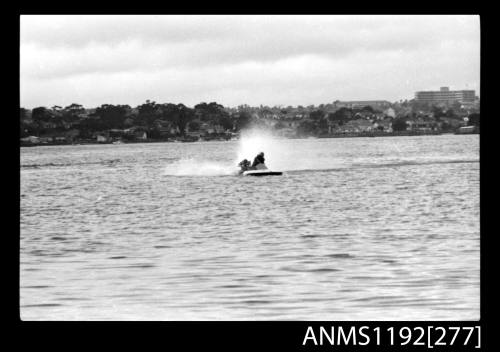 Power boat at speed at time trials at St George Motor Boat Club, Georges River, Sydney