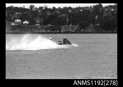 Power boat at speed at time trials at St George Motor Boat Club, Georges River, Sydney