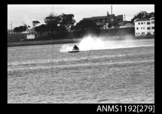 Power boat at speed at time trials at St George Motor Boat Club, Georges River, Sydney