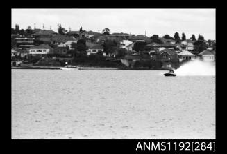 Power boat at speed at time trials at St George Motor Boat Club, Georges River, Sydney