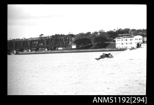 Black and white negative number 22A depicting WASP , 478N Power boat at speed