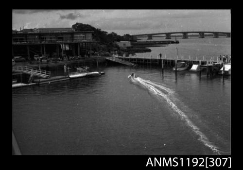 Power boat at speed at St George Motor Boat Club, Georges River, Sydney