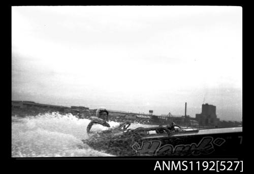 Black and white negative number 8A depicting view of Hawk 726N Power boat at speed