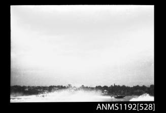 Black and white negative number 9A depicting view of racing power boats at turning marker