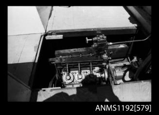 Black and white negative number 2 depicting view of v-6 cylinder steam engine, overhead port side view