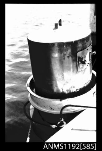 Black and white negative number 8 depicting view of steam boiler mounted outboard on the transome, starboard side view