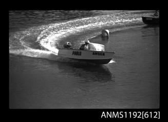 Black and white negative number 13A depicting view of Pablo Aw86n power boat with outboard engine at speed, turning at marker buoy