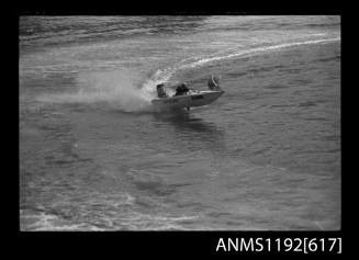 Black and white negative number 18A depicting view of NIPPER MITE Kf88n power boat at speed