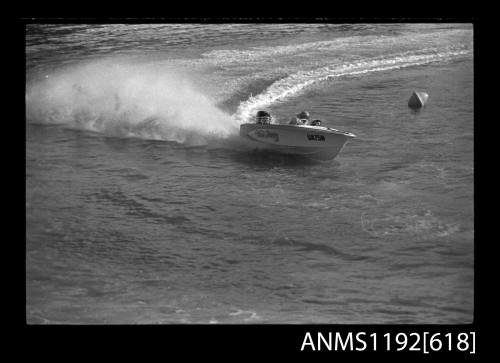 Black and white negative number 19A depicting view of WILD GROOVY Ua75n power boat at speed